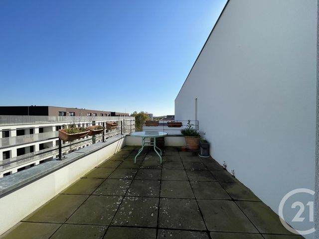 Afficher la photo en grand Appartement Duplex à vendre - 4 pièces - 92.29 m2 - ST JACQUES DE LA LANDE - 35 - BRETAGNE - Century 21 Dréano Immobilier