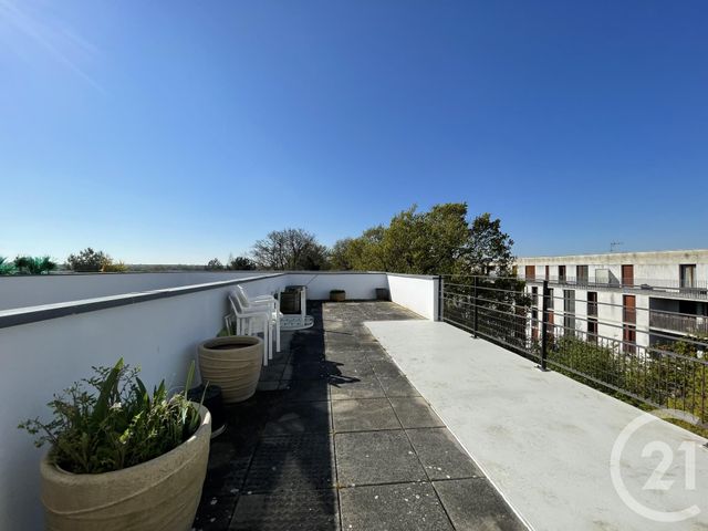 Afficher la photo en grand Appartement Duplex à vendre - 4 pièces - 92.29 m2 - ST JACQUES DE LA LANDE - 35 - BRETAGNE - Century 21 Dréano Immobilier